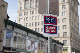 Love Up Guns Down artwork